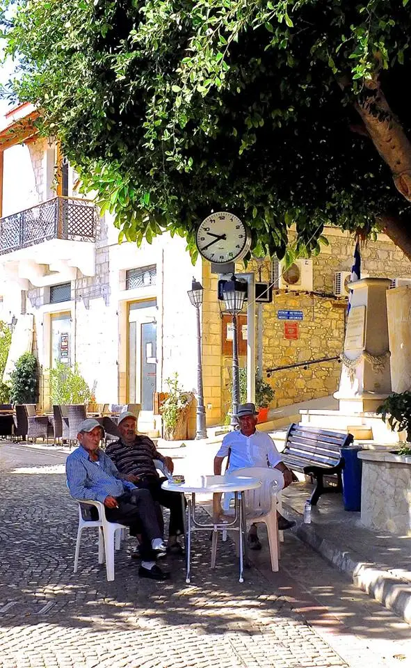 Pissouri men debating over coffee