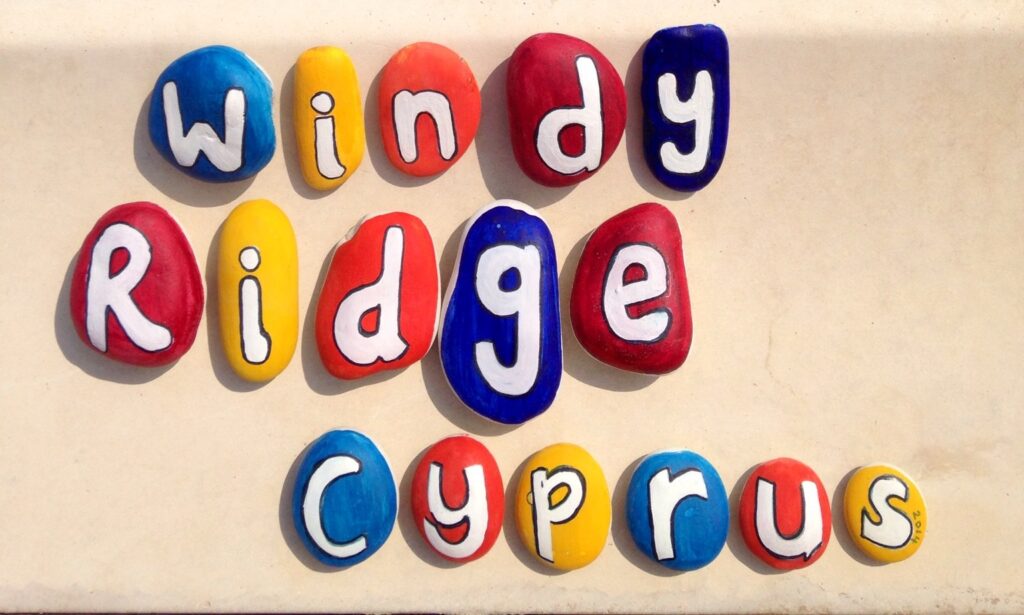 painted stones with "Windy Ridge Cyprus"